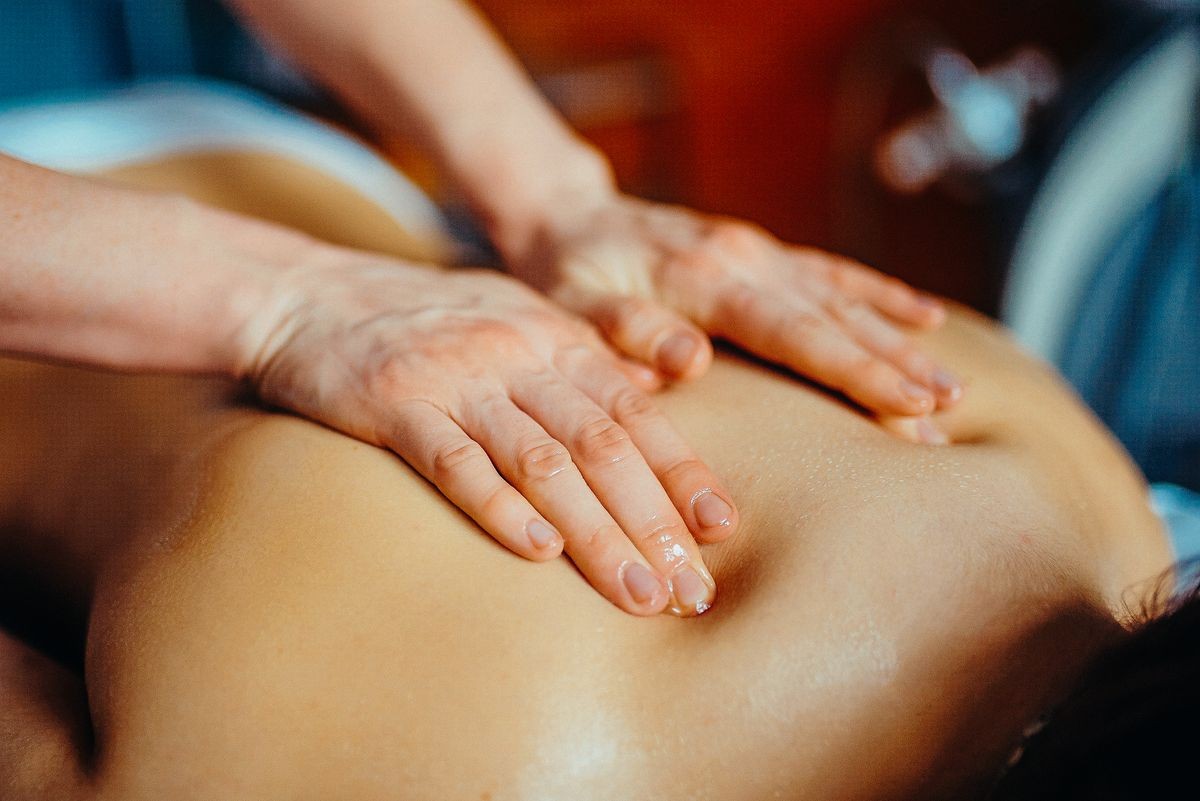 person getting theraputic deep tissue massage